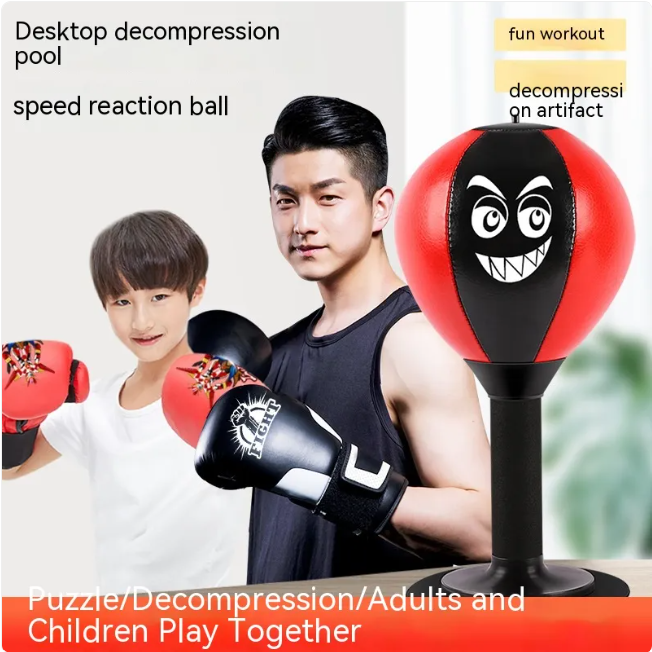 Red and black desktop punching reflex speed ball with cartoon face and black stand