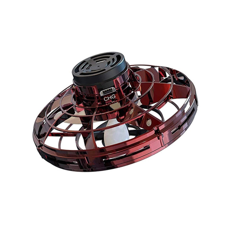 Red and black mini UFO spinner drone toy with top disc and guard cage