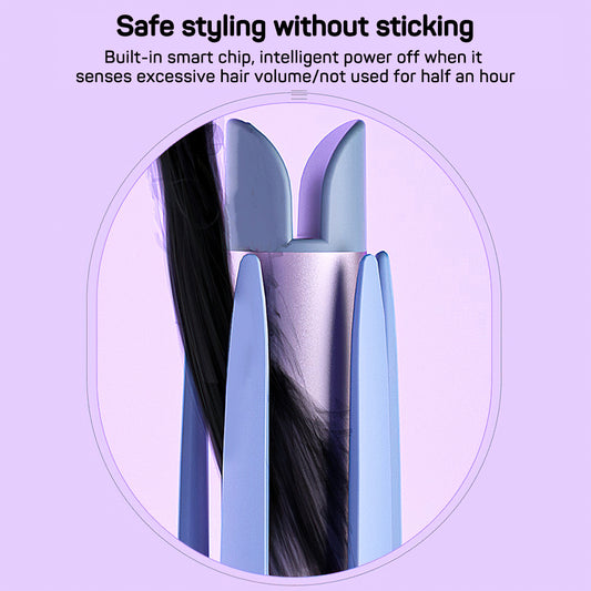 Automatic electric rotating hair curler with dark barrel and shiny silver clamp arms