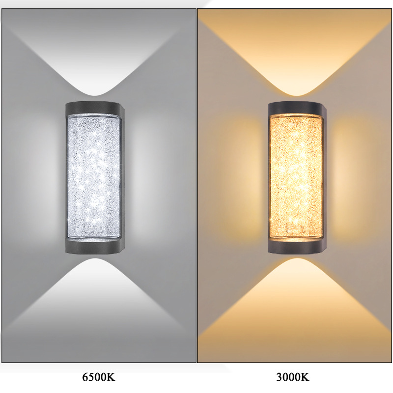 Two square LED wall sconces with black frames and speckled clear or amber glass