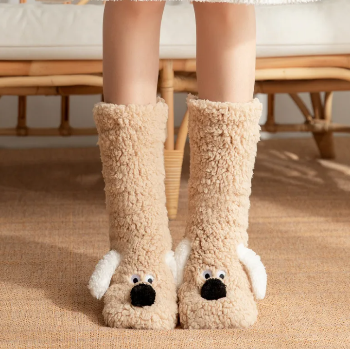 Plush dog face winter socks, tall fuzzy tan pair with black nose and white paws
