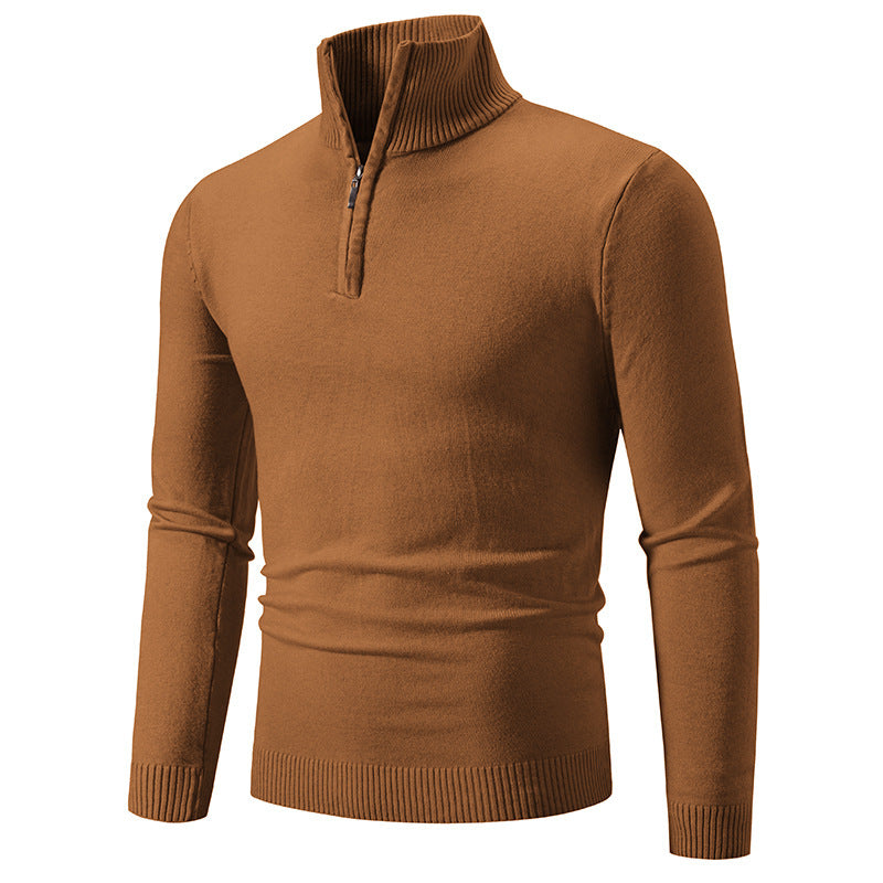 Tan fleece pullover with zip mock neck, ribbed cuffs, and ribbed hem.