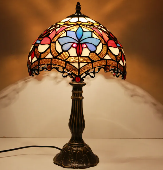 Stained glass bedside table lamp with blue and red butterfly shade and dark bronze base
