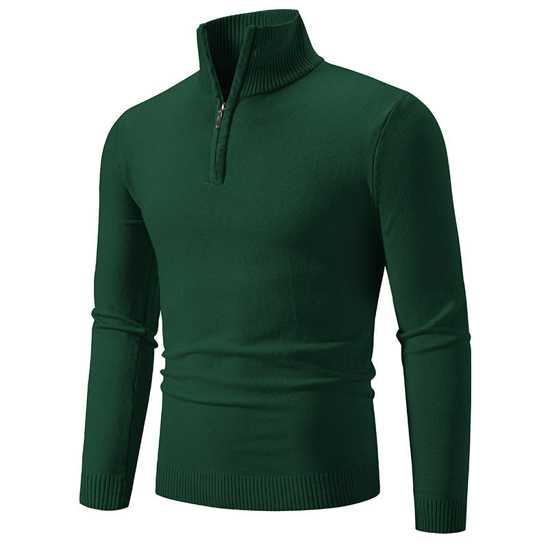 Dark green fleece pullover with half-zip mock neck and ribbed cuffs, hem