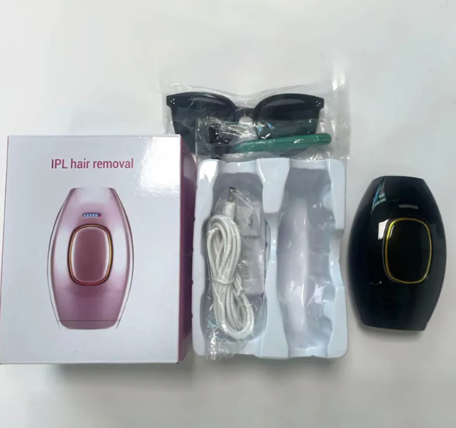 At-home IPL hair removal device kit with rose gold unit, accessories, and dark device