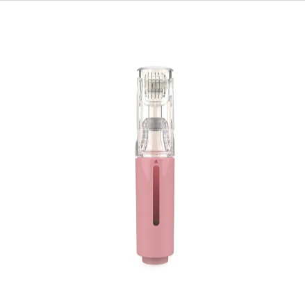 Microneedle roller applicator pen with pink body and clear micro-needle drum, side view