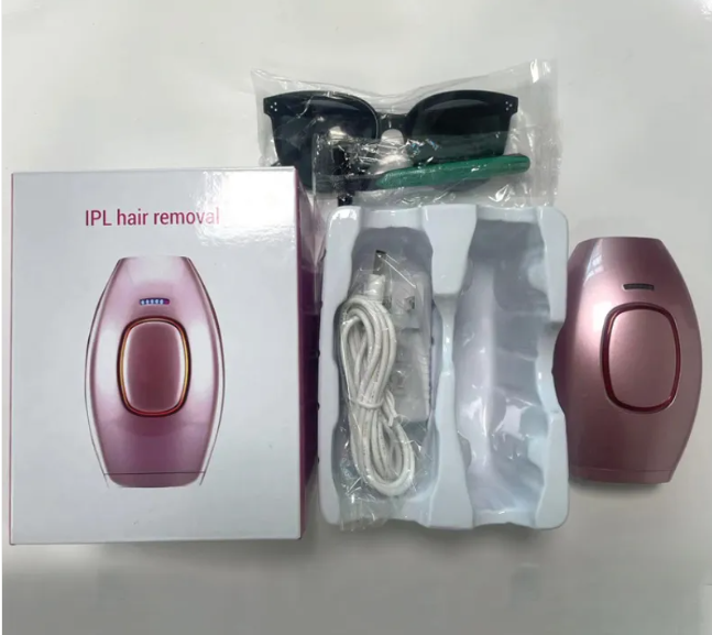 IPL hair removal device kit with rose gold box device, accessory cords, and rose handheld