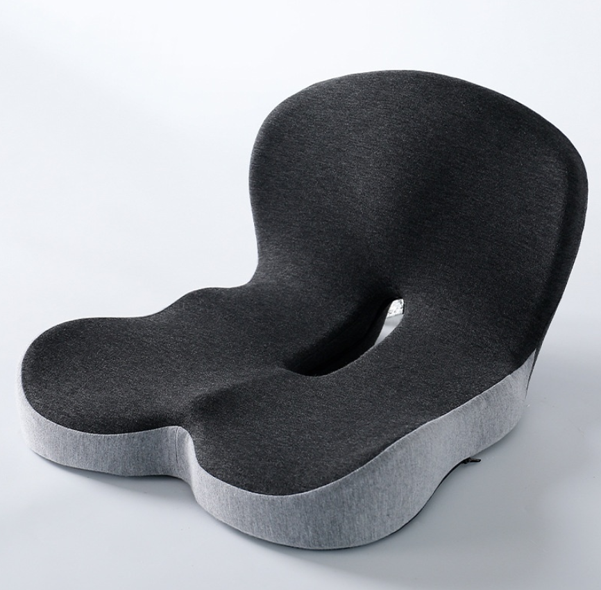 Memory foam ergonomic seat cushion with U-shaped cutout, dark gray top and light gray base.
