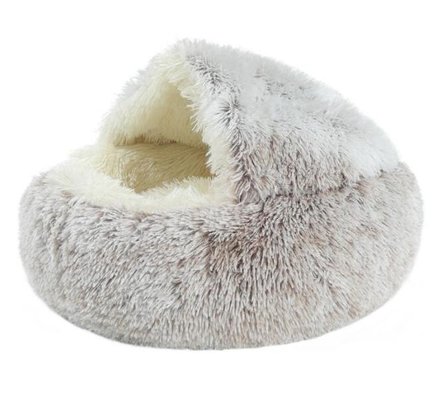 Light gray plush pet bed with raised rim and tunnel opening