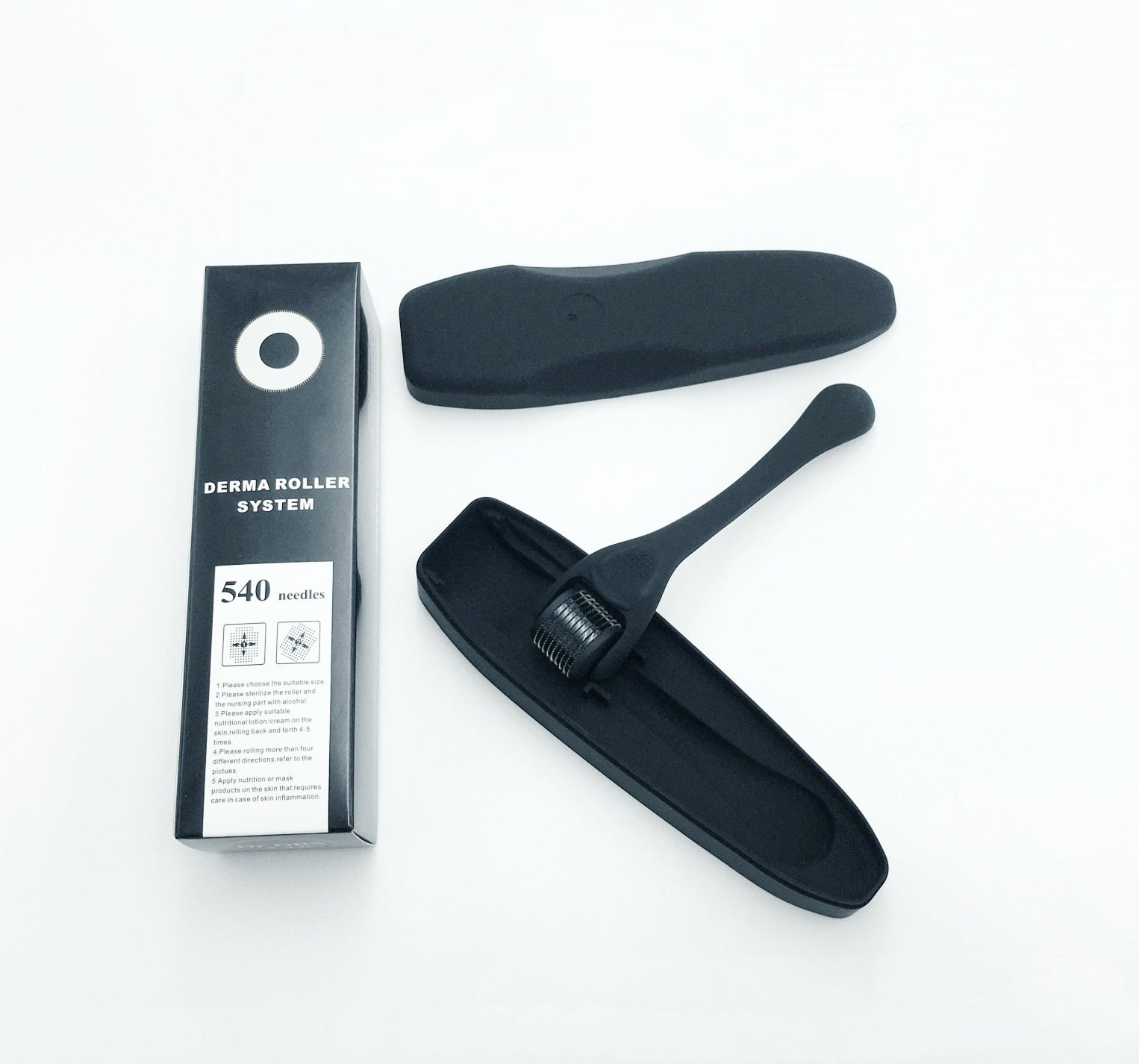 Black microneedling face roller with frosted handle and included product box