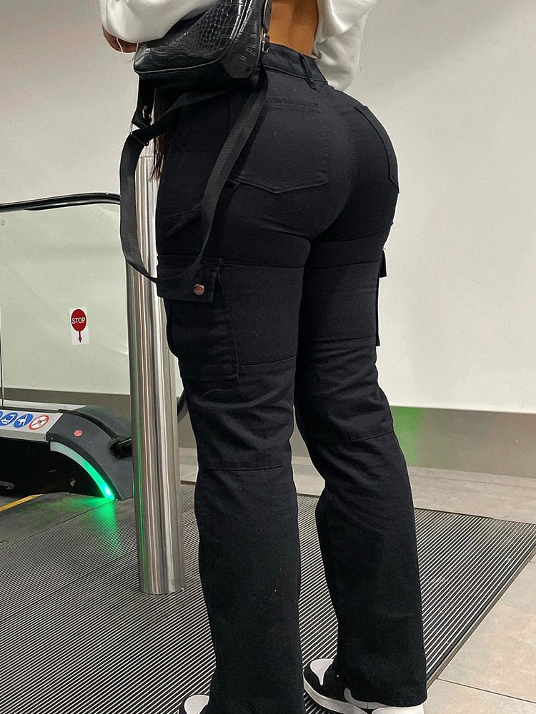 High-waist cargo pants in black denim with utility pockets and belt loops