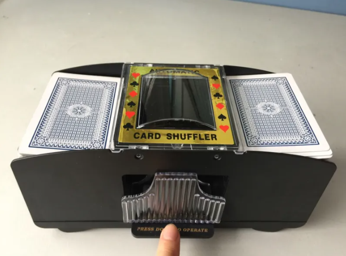 Automatic electric card shuffler, open with card trays and front window display