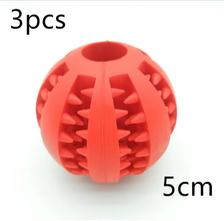 Red rubber treat-dispensing puzzle dog ball with ridged side openings