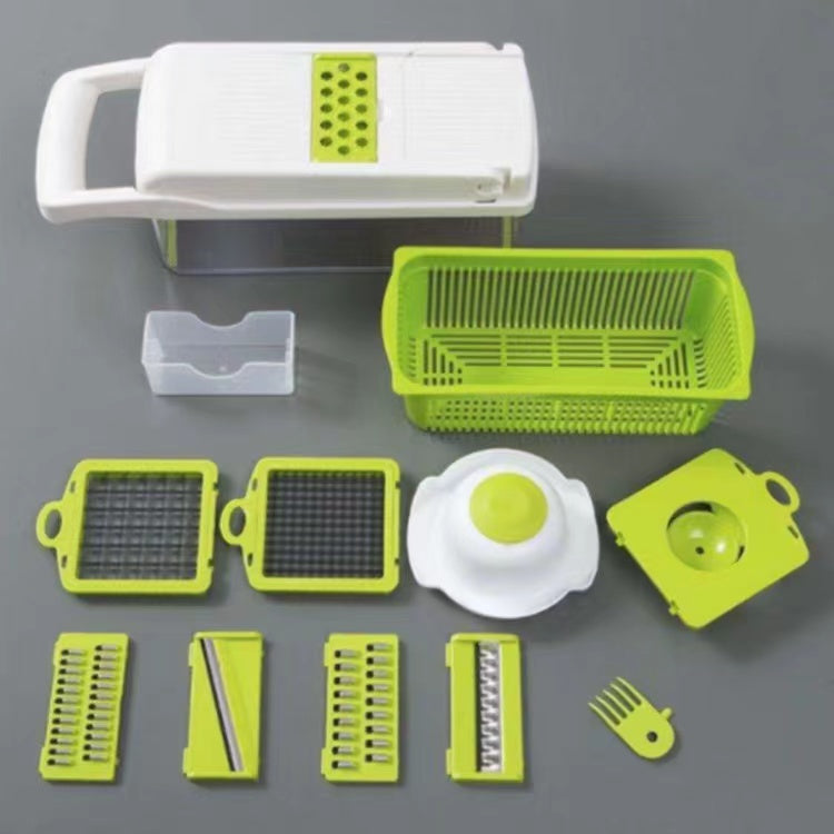 Vegetable chopper and dicer with white handle, green container, and multiple cutting plates