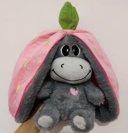 Plush baby breathing doll, gray donkey body with pink hood and smiling face