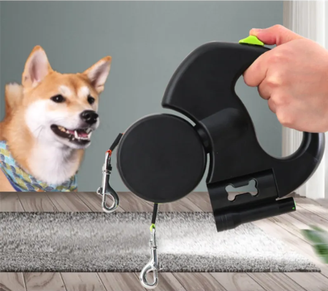 Dual retractable dog leash with black reel, two extendable leads, and metal hooks