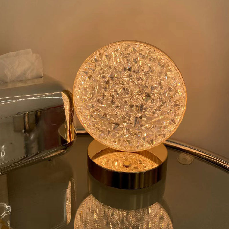 Round moon-shaped acrylic night lamp with crystal-like LED pattern on round base