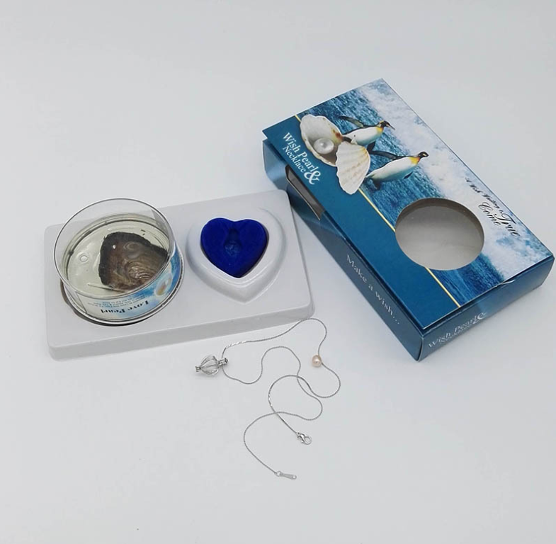 Wish pearl necklace gift set with blue heart pendant, chain, and round keepsake container