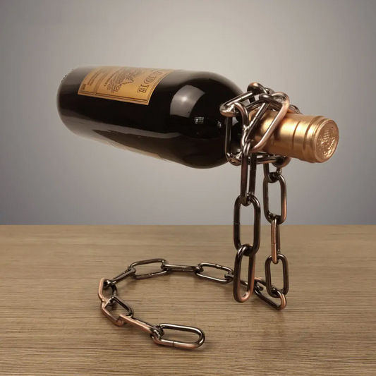 Wine bottle chain holder with dark bottle and bronze-toned metal links